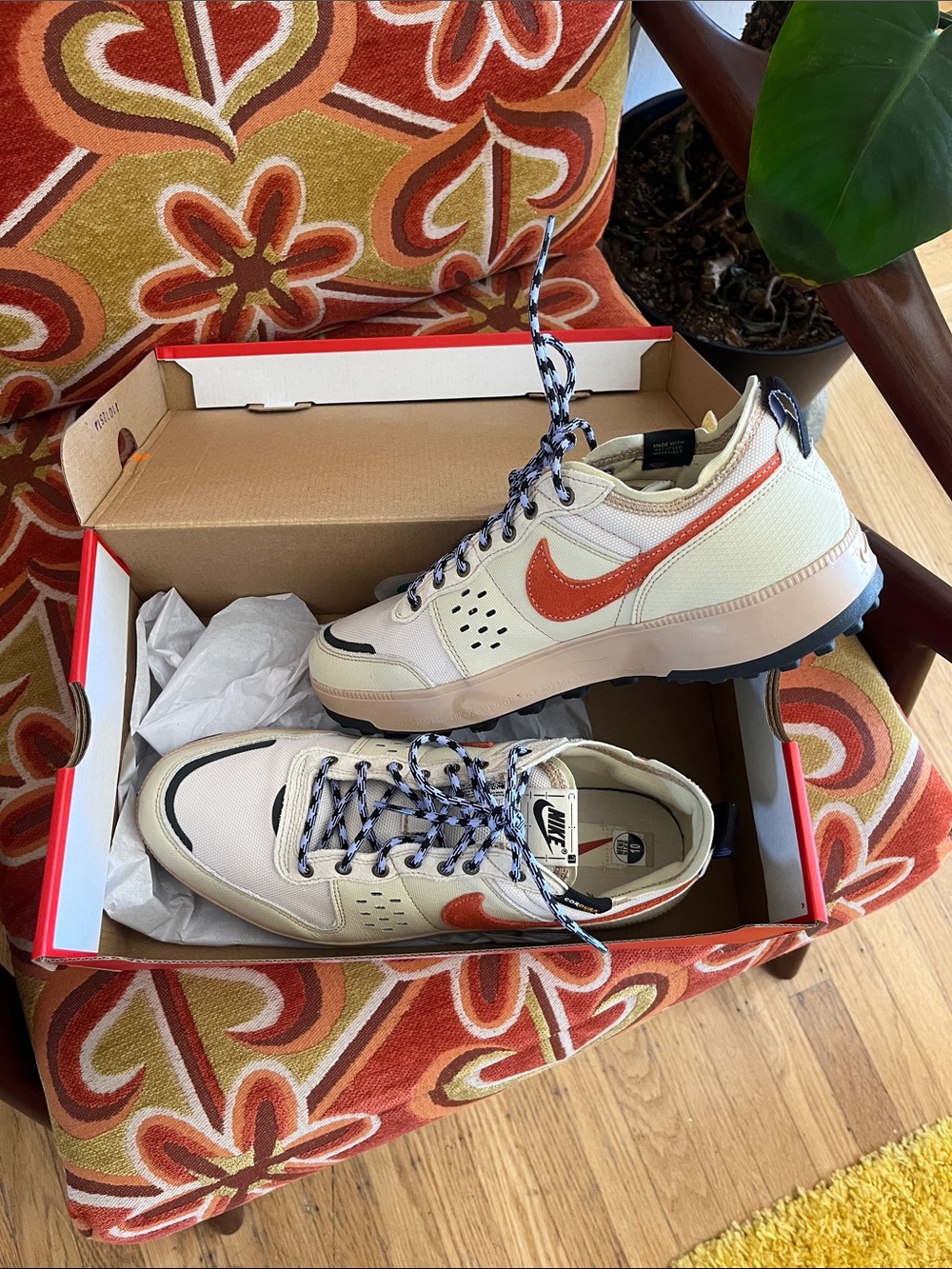 Nike Men's Cream Sneakers with Orange Swoosh and Black Accents